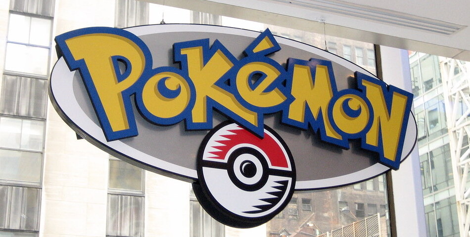 A Pokemon sign in a city
